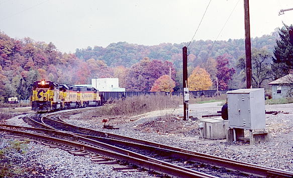 The "Scram" mine run starting up the SC&M with 140 empties. 10-24-86.