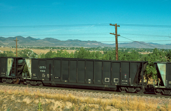 CCTX 1164 on BN/ATSF Joint Line at Littleton CO. 09.19.1986. (Coleto Creek TX, loads).