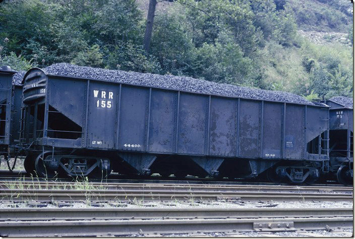 Probably an ex-C&O hopper built in the 1920s. West Carbon WV, 08-20-1973. Winifrede 155.