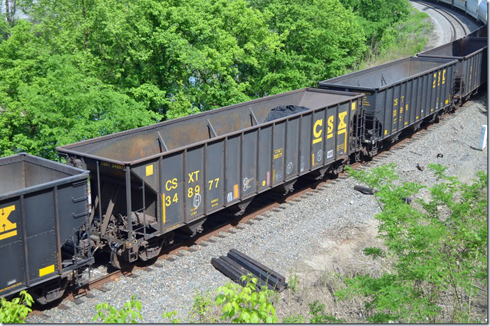 A CSX 4-bay hopper is a rarity these days. CSX 348977 probably came from the L&N. There is usually a cut of empty hoppers on Q692 every day. The loads of whatever they carry go south on another route. Q692 leaving Shelby KY on 05-17-2020.