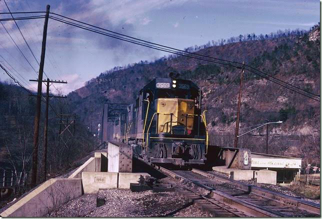 C&O 3569-6003-2309 e/b Elkhorn Shifter at Elkhorn City with interchange loads for the Clinchfield. 12-1970. Big Sandy SD.