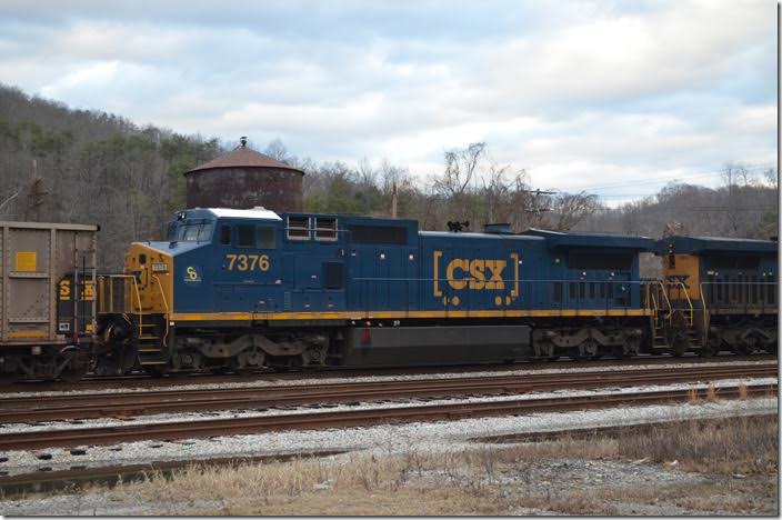 CSX 7376 C&O. View 6. Shelby. That water tank in the background is the last steam-era structure remaining at Shelby. 12-26-2016.