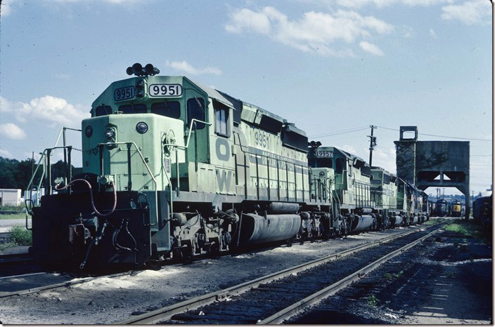 Shamrock Coal acquired a bunch of SD40-2s, tubs and cabooses to insure they would have dedicated equipment to move their coal to customers. The engines and cabooses were built to L&N specs. A company official used the name Oneida & Western from the abandoned short-line that once operated out of Oneida TN. Shamrock had a mine at Manchester KY. L&N. Corbin KY.