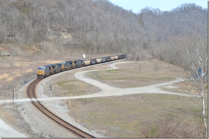 Passing through an open area once occupied with the Chaparral Coal Co. Umet preparation plant, U903-08 with CSX 727-449-3333 heads to Shelby with 200 empty tubs on 03-90-2021. CSX FO Cabin.