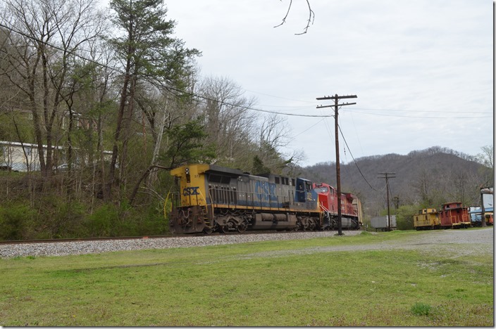 CP 8153-372 passing the Elkhorn City Railroad Museum at the site of the old C&O depot. 03-22-2020. Elkhorn City KY.