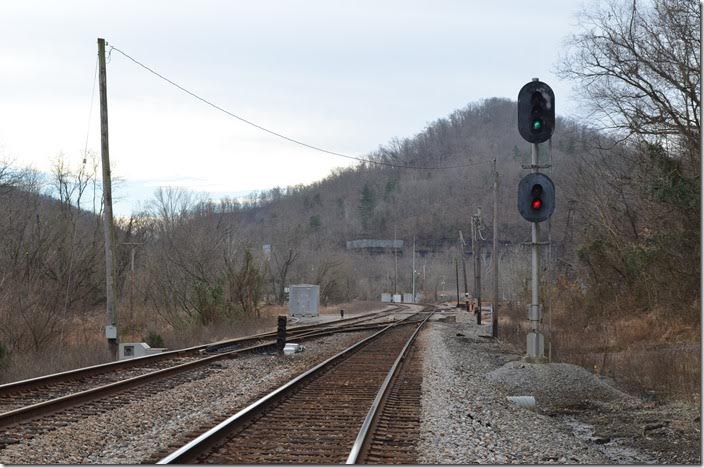 Clear signal for an eastbound at the CSX middle crossover of Prestonsburg passing siding. The Middle Creek SD diverges to the right past the crossover. 01-25-2015.