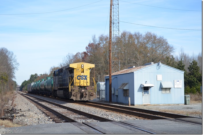CSX 228 southbound local out of Bostic Yard passing Chesnee SC, on the Blue Ridge SD (former CRR). This and coal trains going to the Cliffside Power Plant (Duke) are all that use this once busy line now. 12-06-2015.