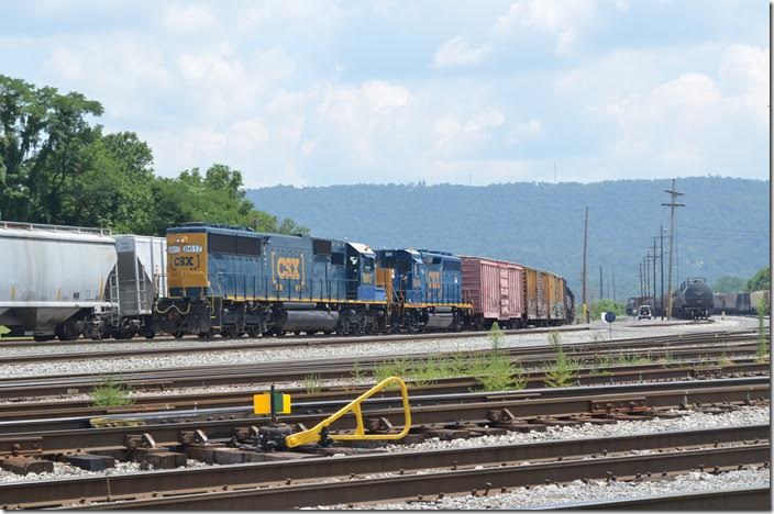 SD50 8617 and “GP40-3” 6544 switch at the west end of the yard. CSX 8617-6544. Cumberland MD.