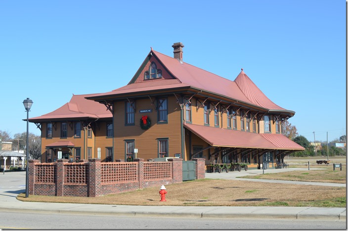 The Hamlet Depot & Museum was moved across the track from the lot in the background.