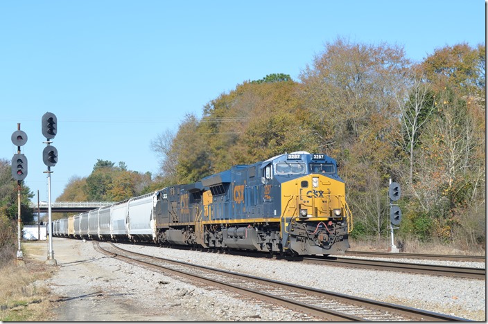 CSX 3287-566 arrives e/b at Raleigh Street with F453-07 (Hamlet-Dillon-Cheraw Turn) and will be heading north into the yard. Hamlet NC.