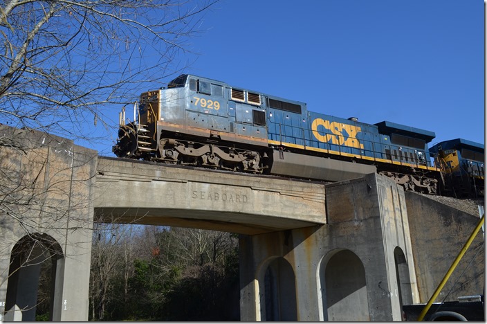 Q471-07 (Rocky Mount-Hamlet) with CSX 7929-7925-7690 is looking at the Bridges Street signal inbound from Pembroke and the Wilmington SD. Hamlet NC.