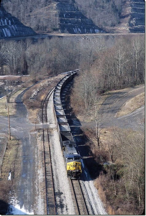 421 has shifter H812-13 and is taking AEPX empties up the Buffalo Sub. to the Pardee Mine. 01-23-2009. The siding looks only fit to park MofW equipment. Taplin yard is gone. C&O. Taplin WV.