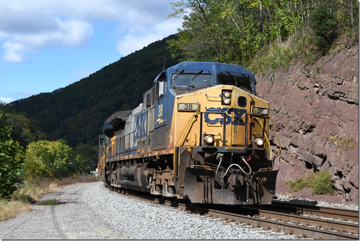 CSX 38-837 are parked at the east end of the Cumberland Narrows (fka Mount Savage Jct.) with a long intermodal train. Usually these trains change crews at Virginia Ave. There wasn’t a crew on the train. 10-07-2023. Cumberland MD.