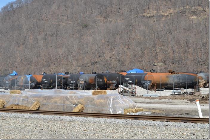 CSX tank cars damaged from the oil train derailment and explosion at Mount Carbon. Handley.