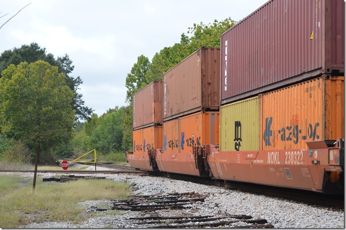 CSX 235-210 Woodward AL. View 2. This crossing was formerly Woodward Iron Company’s line from the blast furnaces to the coke plant and on west to the Mulga coal mine. In 1997 Birmingham Southern was using this track to access the Koppers Coke Plant. The plant was closed in 1998 and demolished. 