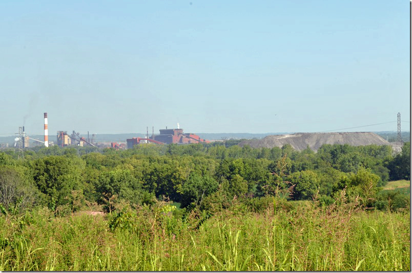 AK Steel’s blast furnace (in distance), BOF (basic oxygen furnace – red building in center), and slag dump. Middletown OH.