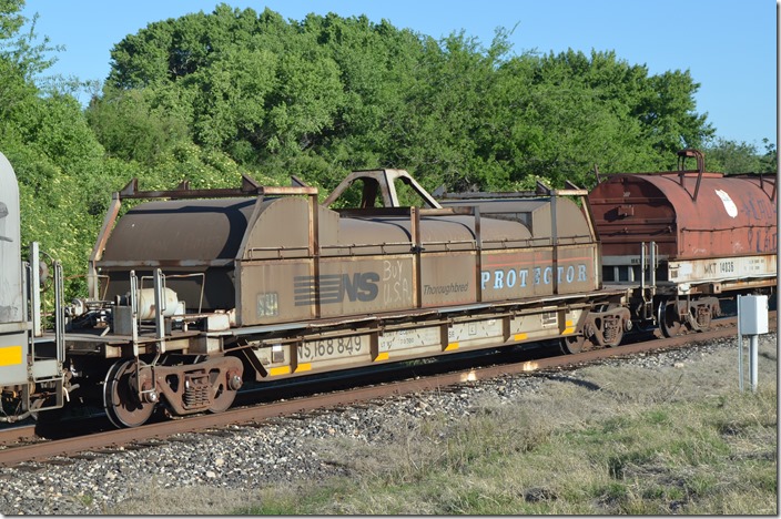 NS coil steel flat 168849 is ex-CR. “PROTECTOR” coil hood is also stenciled “PROtected Temperature Coil Transport On Rail.” Nogales AZ.