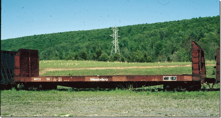 WVCX flat 58 was built 1953. Presumably any pulp wood loaded here was sent to Covington when the yard was in operation. 05-11-1990.