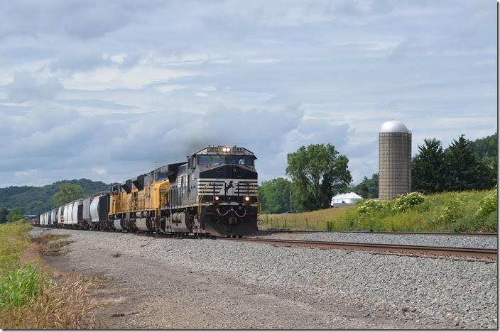 NS 9811-7285-7265 on e/b time freight 188 just north of Lucasville OH, on the Columbus District. Ex-UP SD90MACs will be rebuilt and repainted by NS. 06-17-2015.
