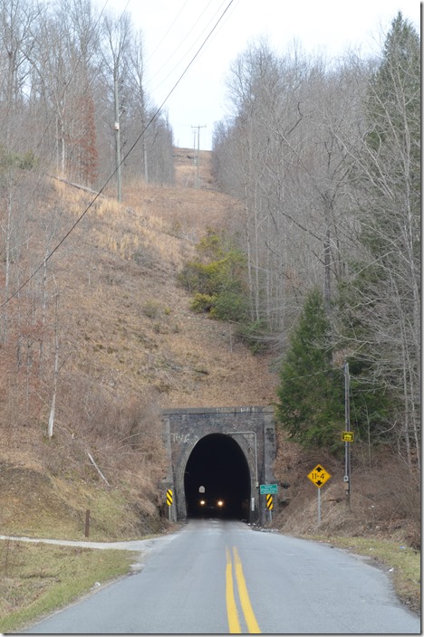ex-NW Dingess Tunnel (3,326 feet in length) was on the original extension to Ohio when built in 1892. The Twelve Pole line had a steep grade coming the 9.2 miles up from Lenore, and the area it traversed provided less business than originally thought. Ten years later the main line was relocated to the banks of the Tug Fork and the Big Sandy to Kenova.
