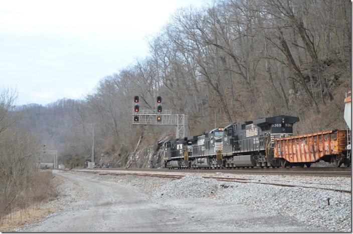 On CSX this would be a “medium approach” meaning to go through the crossovers and be prepared to stop at the next signal. This is what he did. NS 4044-9182-9385. Rawl WV.