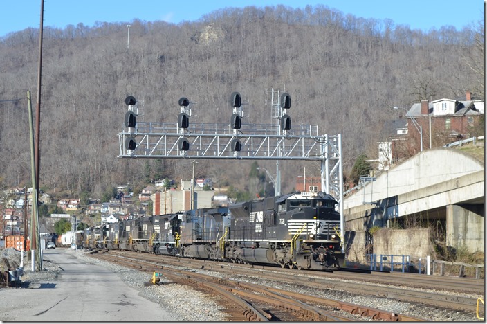 Eastbound time freight 188 arrives behind NS 7321-CEFX 1044-3533-2667-6804-6782-3527-2775-6788. That took some fast writing! Williamson WV.