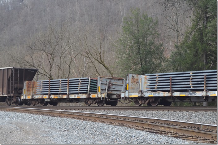 NS bulkhead flats 113322 and 113493 loaded with steel from Steel Dynamics in Roanoke to Steel of West Virginia in Kenova. Naugatuck WV.