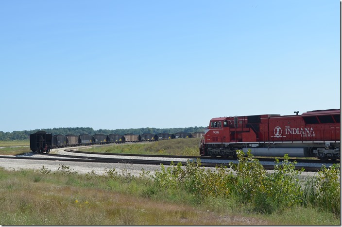 INRD 9008 is slowly moving forward on a track parallel to the IP&L train.
