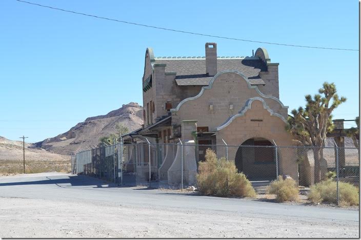 Track side of the depot. An old train order signal was laying behind the fence. LV&T depot. Rhyolite NV.