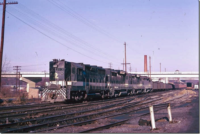Central of Georgia SD35 213 leads three GP30s eastbound from the Tennessee Div. with a L&N coal train. 12-24-1973.