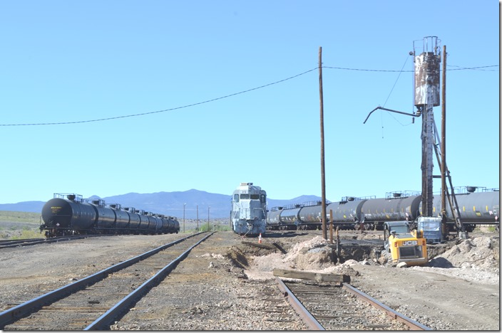 Improvements are underway. The tank cars are probably for sulfuric acid. Southwestern RR yard. Hurley NM.