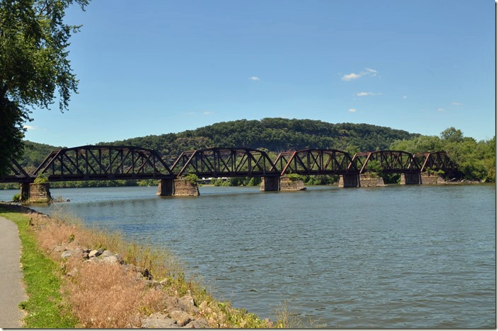 Former PRR bridge between Northumberland (right) and Sunbury (left). The East Branch of the Susquehanna joins the West Branch in the distance. We are in Island Park. NS bridge. Sunbury PA.