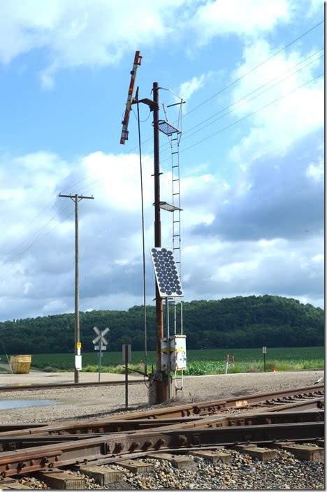 In PRR and PC days there was a tower at Morgan Run to control the interlocking with W&LE-NKP-N&W. In Conrail days after the Panhandle had been downgraded, both roads were required to stop before proceeding. This looks like a manual tilting stop signal on the old Zanesville Br. I suppose the solar cells are for the lights. It is all G&W-owned now. OC interlocking signal. Morgan Run OH.