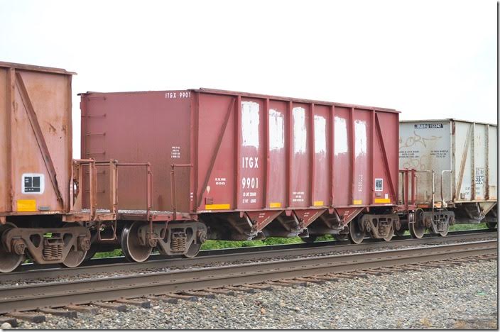 ITGX is a reporting mark for The Andersons. Car was formerly used by Vulcan Materials. On CSX e/b K934-17 empty rock train. ITGX 9901 and 9938 (series 9900-9941) originated as GRR (Georgetown Railroad) 803 and 894, respectively, built by Ortner in 08-10-1974. ITGX hopper 9901. Fostoria.