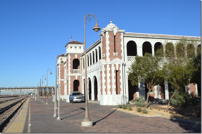 The former AT&SF station and Harvey House Restaurant now houses the local chamber of commerce. Amtrak’s Southwest Limited stops here also. This view is looking west. The big hump yard is around the curve. Barstow CA.