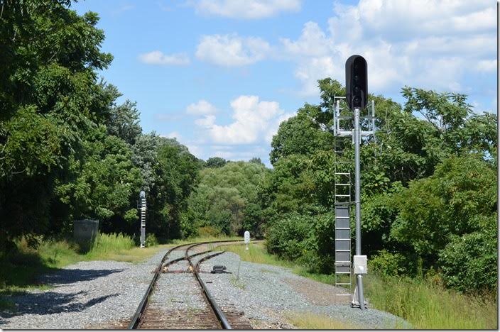 A four-light signal looking east at the west end of Afton siding. Buckingham Branch eb signal WE. Afton.