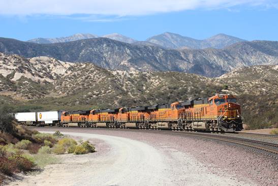 BN-SF 8234, a GM SD75M; BN-SF 7381, a GE ES44DC; BN-SF 6648, a GE ES44C4; BN-SF 7032, a GE ES44C4; and BN-SF 7892 a GE ES44DC, are east bound near Mile Post 59.4. 