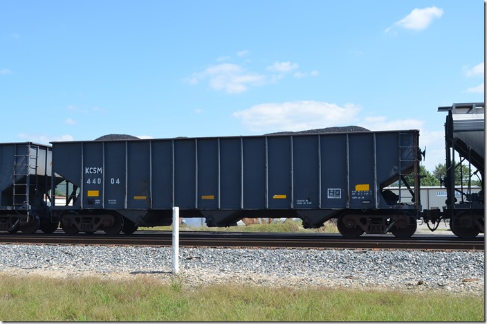 KCSM (Kansas City Southern de Mexico) hopper 44004 has a volume of 3420 cubic feet. Heavener OK. 09-25-2014.