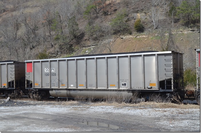 GGPX (General American Marks) tub 120525 was built by Freight Car America and has a volume of 4520 cubic feet. It is moving on the SV&E SD at Esco KY on 03-21-2015.