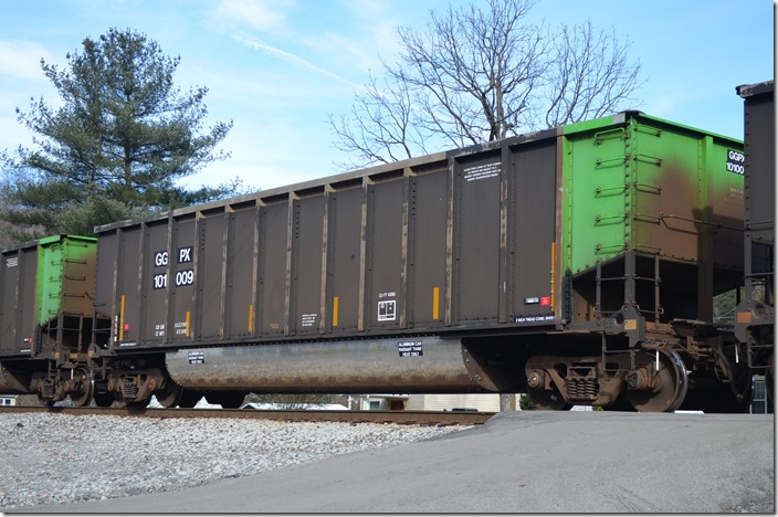 GGPX (General American Marks) tub 101009 was built by Johnstown-America in 1998. It has a volume of 4380 cubic feet. Notice the unpainted tub and the white numbers on a black background. Fords Branch KY. 12-26-2014.