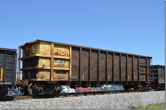 BTCX gon 2475 (Everest Railcar Services) on East Tennessee Ry. at Johnson City TN, 04-28-1915. Scrap loading for Omni Source on former ET&WNC.