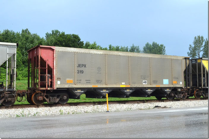 JEPX hopper 319 is stored near the power plant at East Mt. Carmel IN. It was built by J-A in 12-1999.