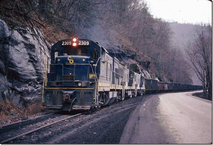 I’m confused about this one. Seems like the train was heading east (up the creek) at Montcoal, but I can’t explain those coal loads unless they were cleaner coal. 12-03-1977. Big Coal, Cabin Creek SD.