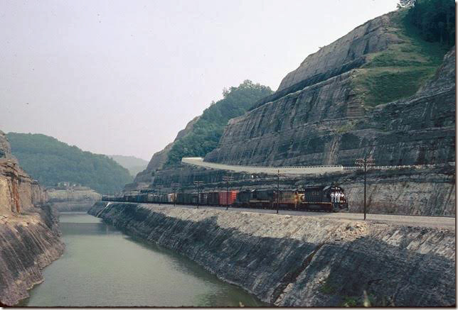 C&O 7536-2329-3309 on w/b #97. First train through Pikeville Cut-thru Project. 07-07-1978. Big Sandy SD.