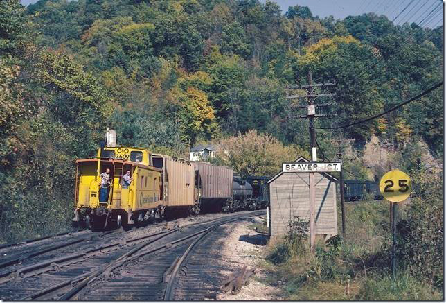 C&O caboose 3609 on rear of w/b coal train out of Martin entering Big Sandy main at Beaver Jct. 10-1977. E&BV SD Martin.