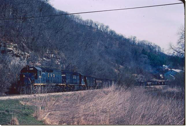 C&O 3916-3859 with w/b E&BV Shifter at Glo KY (Wayland). 03-1980. E&BV SD Martin.