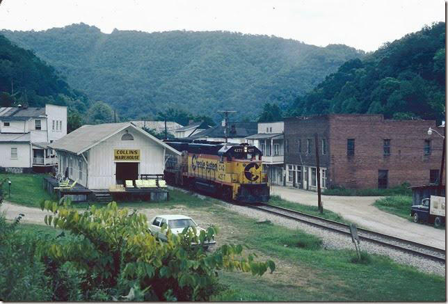 C&O 4277 passing former depot at Lackey KY with w/b E&BV Shifter. 08-1981. E&BV SD Martin.