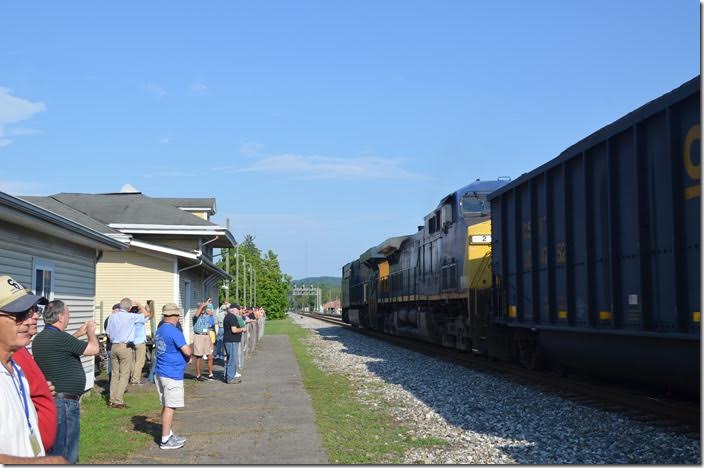 Almost on queue a coal train rolled west behind CSX 3033-2. St Albans WV.