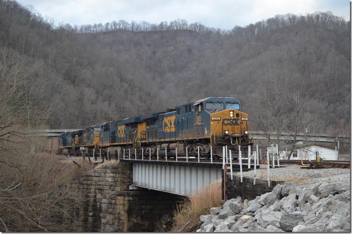 CSX e/b T173-23 behind 585-897-500-7376 arrives Shelby with 104 empty VAPX and TILX rapid discharge hoppers for Myra mine. 12-26-2016.