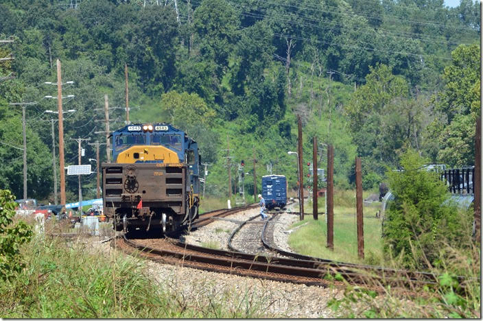 H744 was instructed to stay in the clear until an eastbound passed. I anticipated a long coal train with DP units. No, I got 4543-4041 pushing a gon on work train W004-24. The gon was stashed at Sandy Hook, and the train proceeded on to Gladstone. The crew was taxied back to Clifton Forge. CSX 4543-4071. Reusens VA.